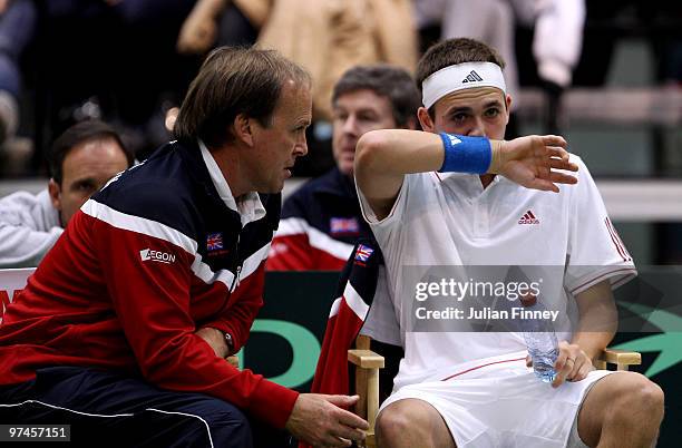 Captain John Lloyd gives advice to Dan Evans of Great Britain in his match against Ricardas Berankis of Lithuania during day one of the Davis Cup...