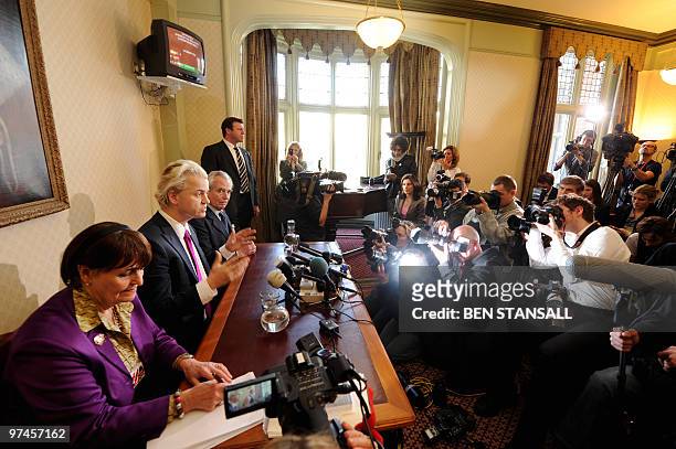 Dutch far-right lawmaker Geert Wilders, Baroness Cox and UK Independence Party Leader Lord Pearson address a press conference in London, on March 5,...