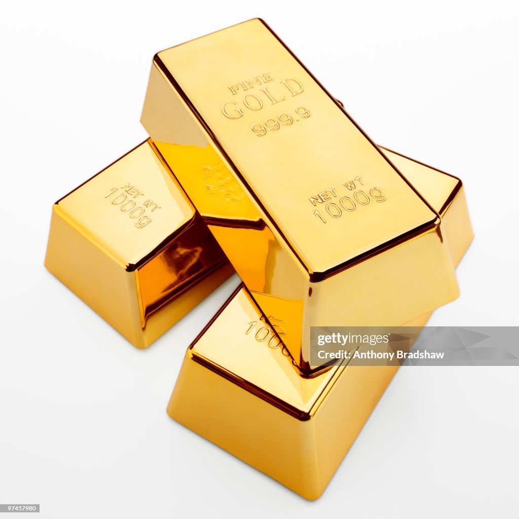 Three fine gold ingots