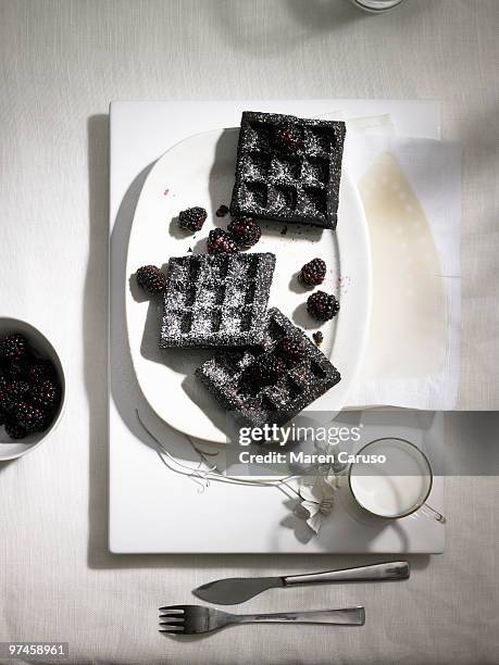 burnt waffles on a white plate - carcinogen stock pictures, royalty-free photos & images