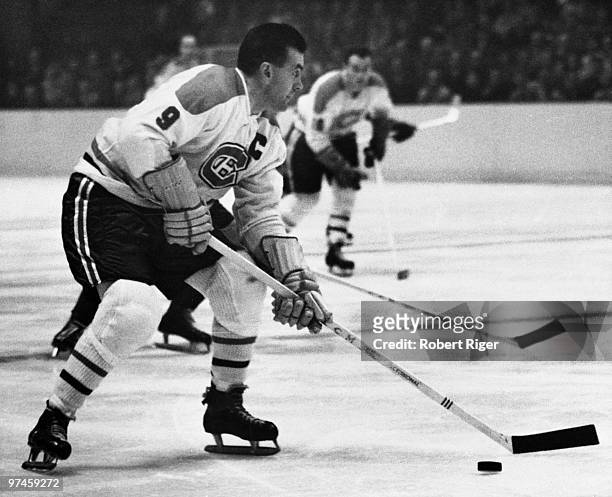 Maurice "Rocket" Richard of the Montreal Canadiens skates with the puck during a game circa 1956-1960 at the Montreal Forum in Montreal, Quebec,...