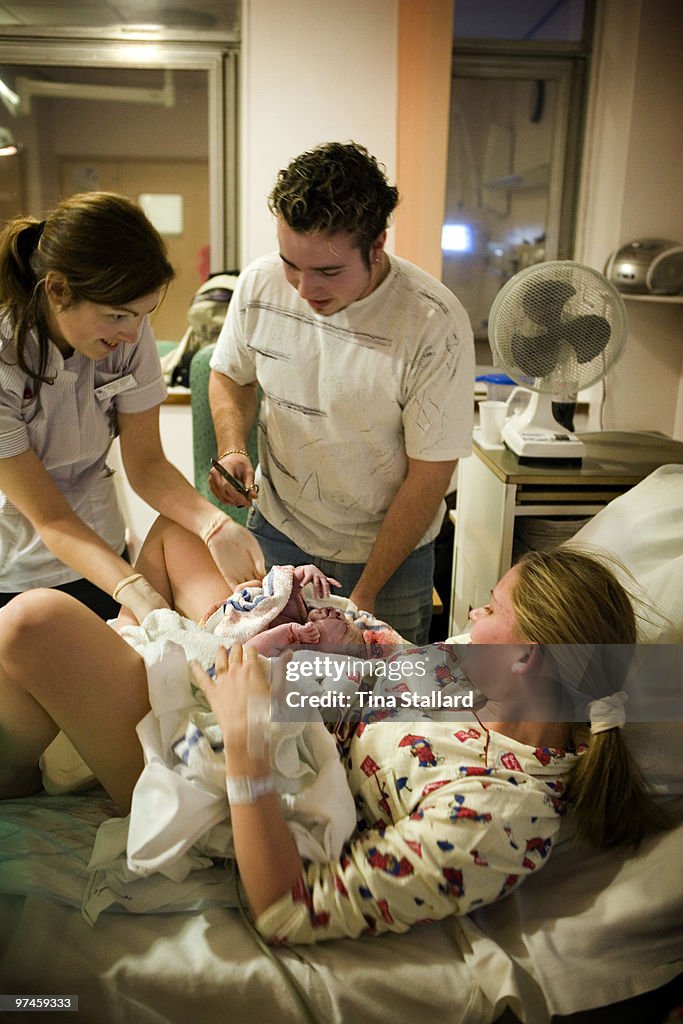 A teenage mother giving birth to her second child in hospital. The