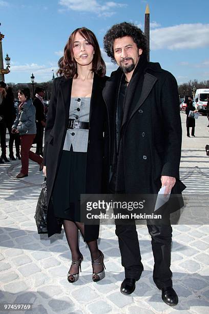 Dolores Chaplin and Radu Mihaileanu attend the Christian Dior Ready to Wear show as part of the Paris Womenswear Fashion Week Fall/Winter 2011 at...