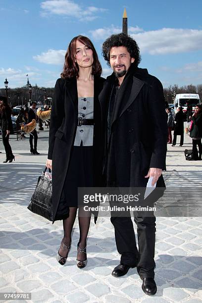Dolores Chaplin and Radu Mihaileanu attend the Christian Dior Ready to Wear show as part of the Paris Womenswear Fashion Week Fall/Winter 2011 at...