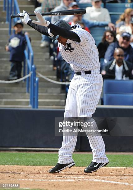 Designated hitter Marcus Thames of the New York Yankees is hit by an inside pitch against the Pittsburgh Pirates on March 3, 2010 at the George M....