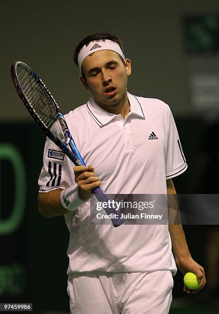 Dan Evans of Great Britain looks down in his match against Ricardas Berankis of Lithuania during day one of the Davis Cup Tennis match between...