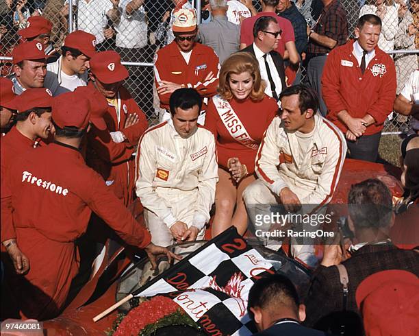 Lorenzo Bandini and Chris Amon won the Daytona 24 in a Ferrari 330P4. The trophy queen is Winkie Louise.