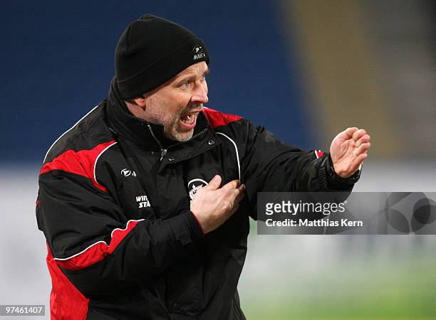 Head coach Thomas Finck of Rostock reacts during the Second Bundesliga match between FC Hansa Rostock and Rot-Weiss Ahlen at the DKB Arena on March...