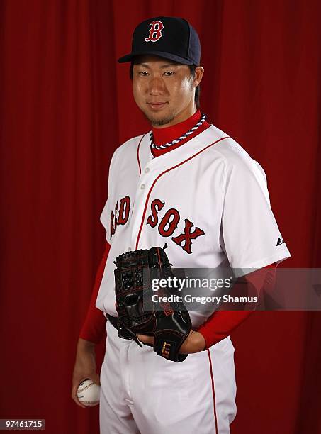 Junichi Tazawa of the Boston Red Sox poses during photo day at the Boston Red Sox Spring Training practice facility on February 28, 2010 in Ft....