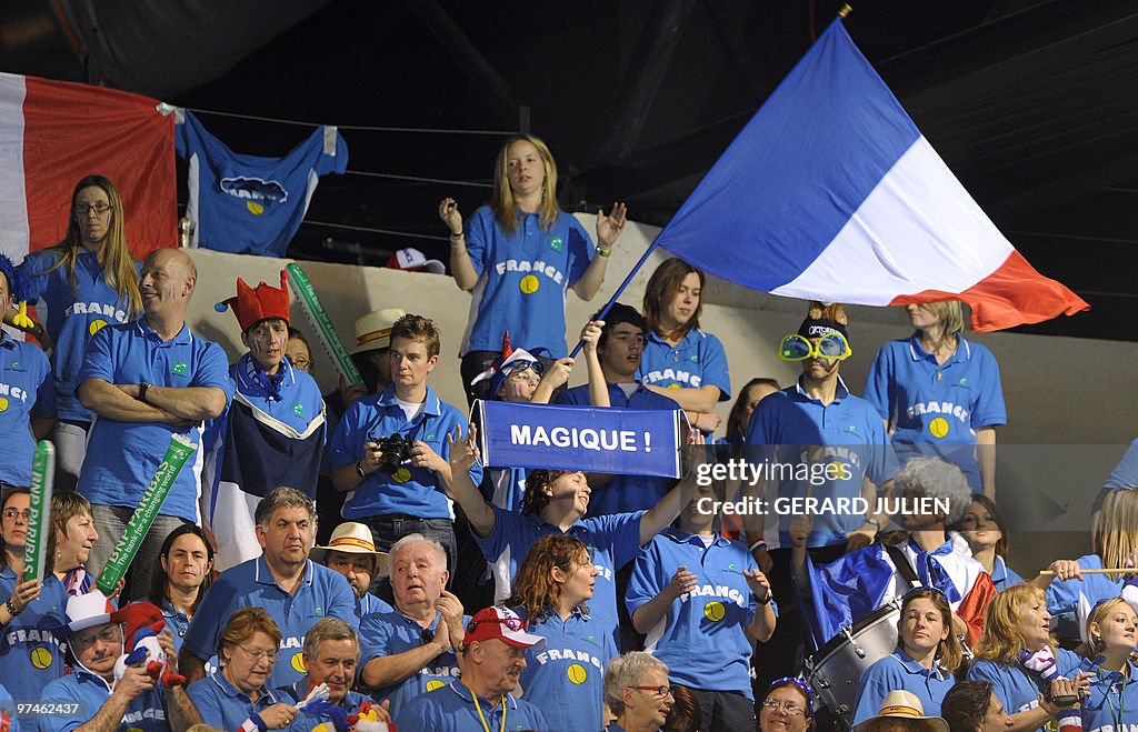 French supporters celebrate after tennis