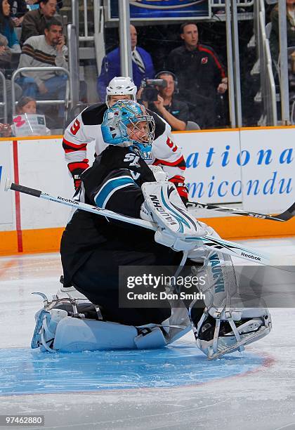 Zack Parise of the New Jersey Devils charges toward Evgeni Nabokov of the San Jose Sharks during an NHL game on March 2, 2010 at HP Pavilion at San...