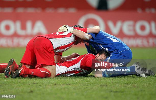 Goalkeeper Sascha Kirschstein of Ahlen celebrates with team mates after winning the Second Bundesliga match between FC Hansa Rostock and Rot-Weiss...