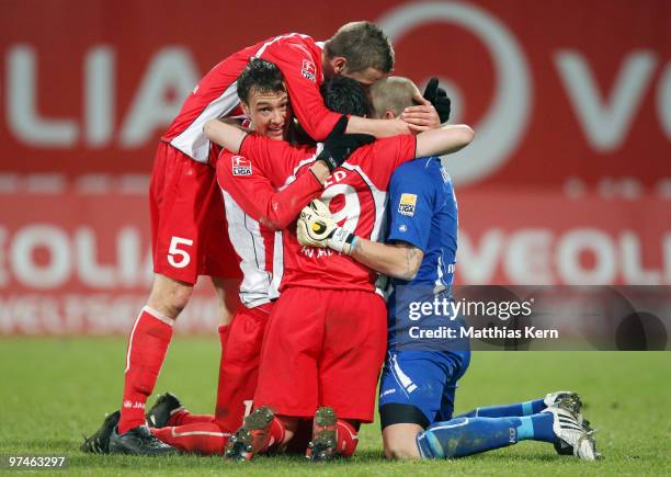 Goalkeeper Sascha Kirschstein of Ahlen celebrates with team mates after winning the Second Bundesliga match between FC Hansa Rostock and Rot-Weiss...