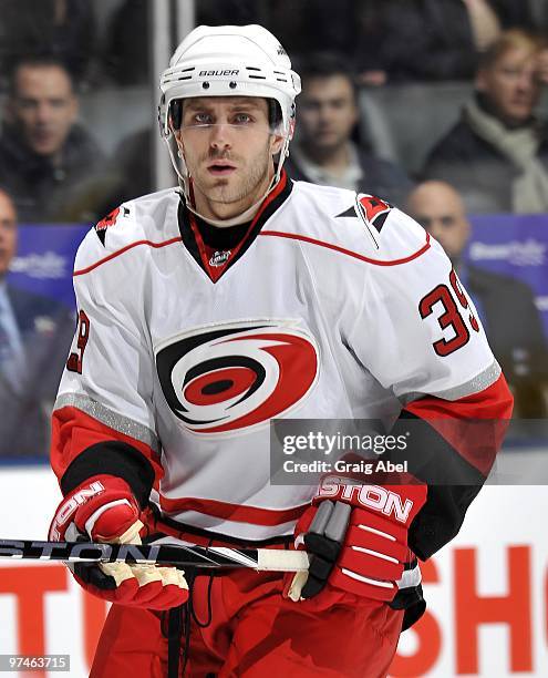 Patrick Dwyer of the Carolina Hurricanes looks on during a break in the game against the Toronto Maple Leafs on March 2, 2010 at the Air Canada...