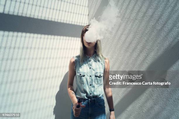 vapor smoke - vaping danger stock pictures, royalty-free photos & images