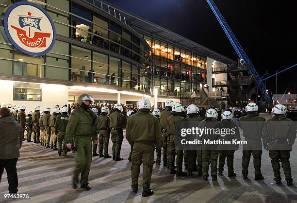 Police is seen after the Second Bundesliga match between FC Hansa Rostock and Rot-Weiss Ahlen at the DKB Arena on March 5, 2010 in Rostock, Germany.