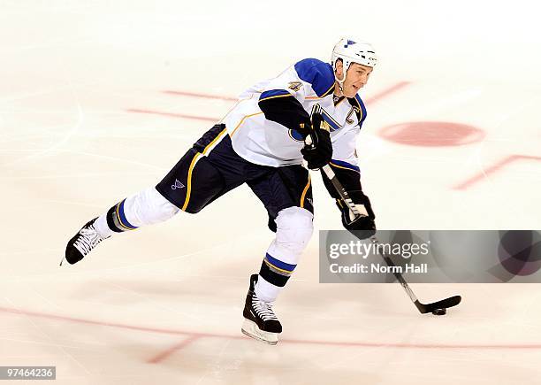 Eric Brewer of the St.Louis Blues passes the puck up ice against the Phoenix Coyotes on March 2, 2010 at Jobing.com Arena in Glendale, Arizona.