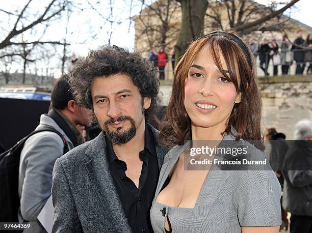 Radu Mihaileanu and Dolores Chaplin attend the Christian Dior Ready to Wear show as part of the Paris Womenswear Fashion Week Fall/Winter 2011 at...