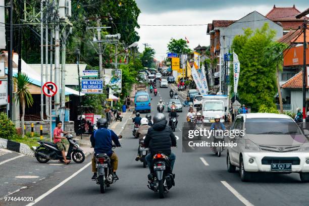 seminyak bali - indonesia bikes traffic stock pictures, royalty-free photos & images