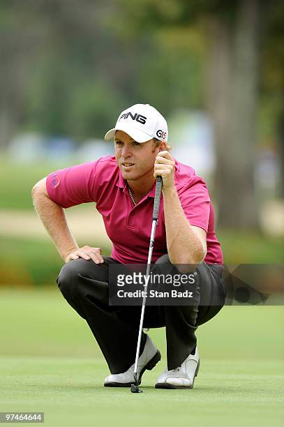 Adam Bland of Australia waits for play at the fifth green during the second round of the Pacific Rubiales Bogota Open Presented by Samsung at Country...