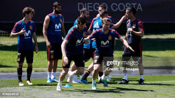 Saúl Ñíguez of Spain and Nacho Monreal of Spain warm up during a training session on June 12, 2018 in Krasnodar, Russia.