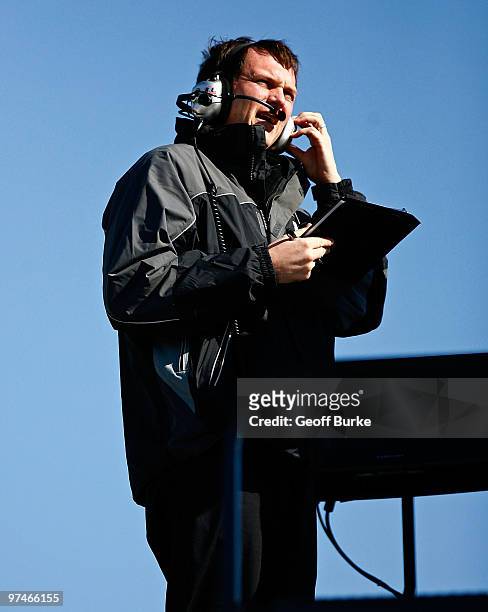 Steve Letarte, crew chief for the DuPont/National Guard Chevrolet, watches from the top of the team hauler during practice for the NASCAR Sprint Cup...