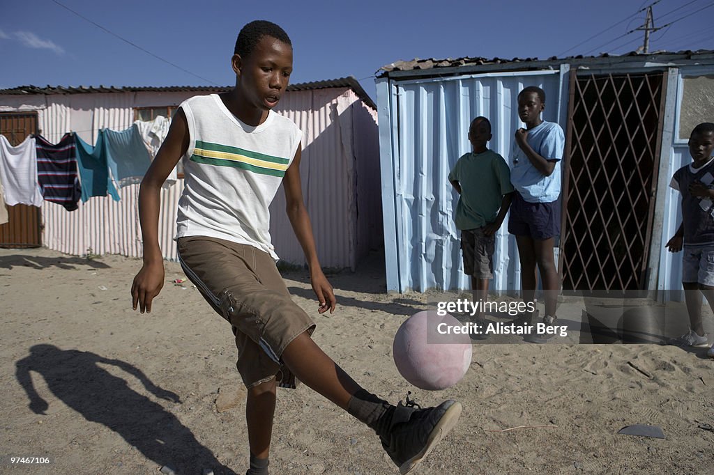 Boys playing football in South Africa