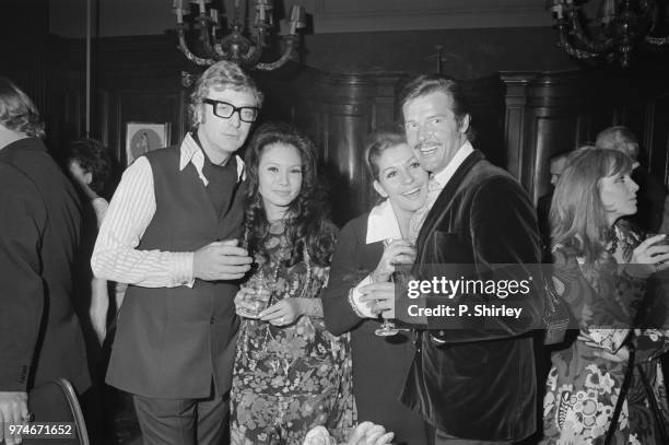 Italian actress Luisa Mattioli and English actor, producer and author Michael Caine at their joint birthday party with their partners English actor...