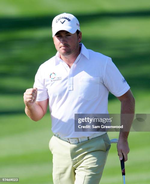 Graeme McDowell of Northern Ireland reacts to a birdie putt on the 13th hole during the second round of the Honda Classic at PGA National Resort And...