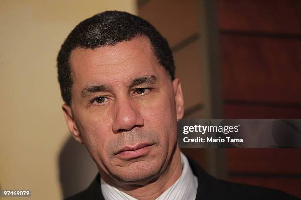 New York Governor David Paterson waits to speak at the grand opening of The Palm Bar and Grille at John F. Kennedy International Airport March 5,...