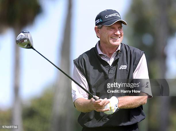 Nick Price of Zimbabwe smiles before his tee shot on the sixth hole during the first round of the Toshiba Classic at the Newport Beach Country Club...