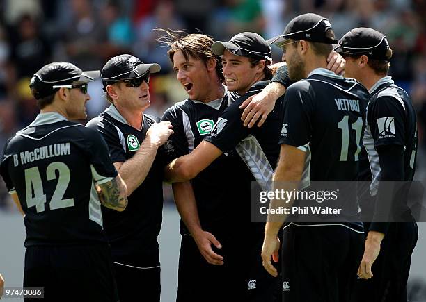 Shane Bond of New Zealand celebrates his wicket of Michael Clarke of Australia during the Second One Day International match between New Zealand and...