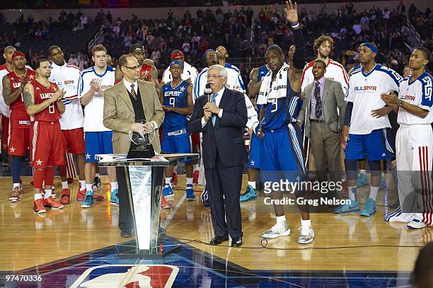 All Star Game: NBA commissioner David Stern presenting MVP trophy to East All Star Dwyane Wade after game vs West All Stars during All Star Weekend...