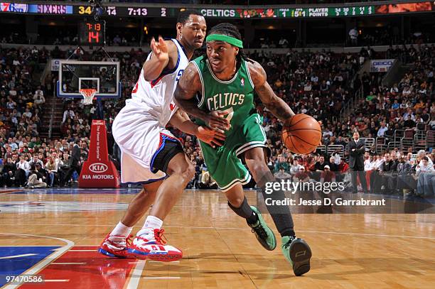 Marquis Daniels of the Boston Celtics drives against Willie Green of the Philadelphia 76ers during the game on March 5, 2010 at the Wachovia Center...