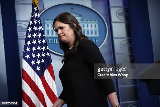 White House Press Secretary Sarah Huckabee Sanders leaves the podium after a White House daily news briefing at the James Brady Press Briefing Room...