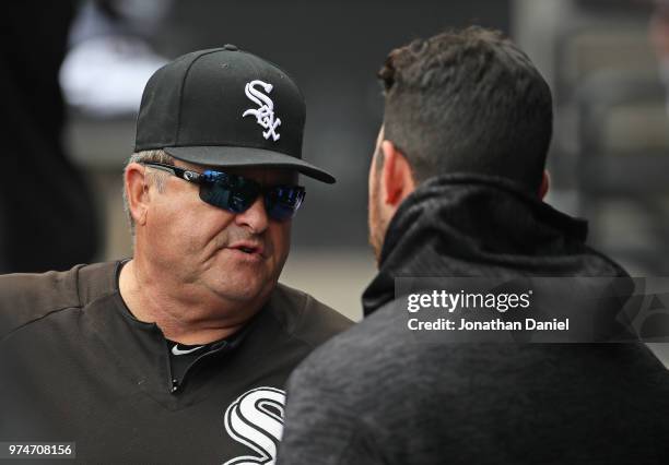 Pitching coach Don Cooper talks with pitcher Carlos Rondon after Rondon finished pitching against the Cleveland Indians at Guaranteed Rate Field on...