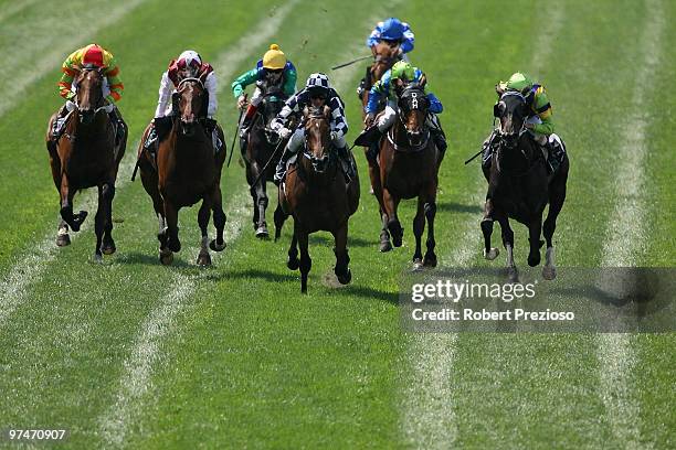 Glen Boss riding Shamrocker leads the field to win race Three VRC Sires Produce Stakes during the Super Saturday Raceday meeting at Flemington...