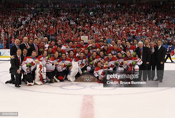 Team Canada celebrates with the gold medal after winning the ice hockey men's gold medal game between USA and Canada on day 17 of the Vancouver 2010...