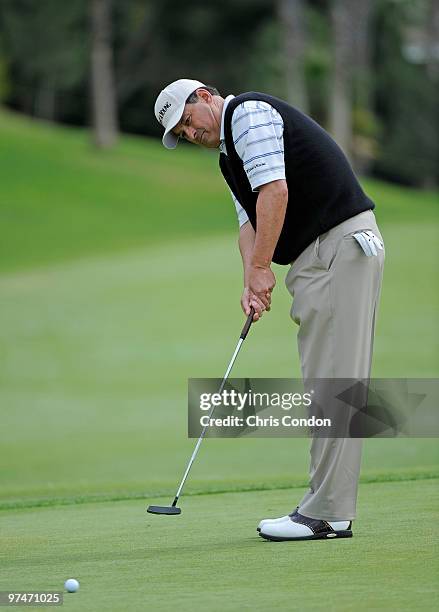 Loren Roberts putts for birdie on during the first round of the Toshiba Classic at Newport Beach Country Club on March 5, 2010 in Newport Beach,...