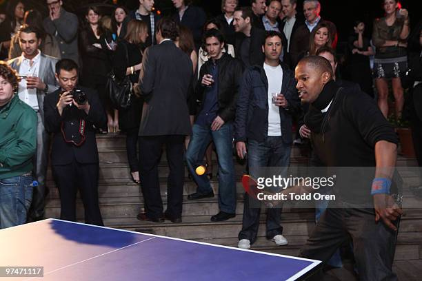 Jamie Foxx plays ping-pong at the Pre-Oscar Ping Pong party hosted by Susan Sarandon and Spin New York at Mondrian Hotel on March 4, 2010 in West...