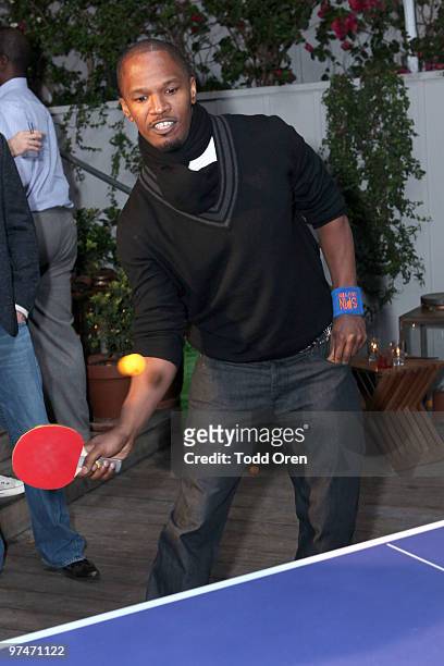 Jamie Foxx plays ping-pong at the Pre-Oscar Ping Pong party hosted by Susan Sarandon and Spin New York at Mondrian Hotel on March 4, 2010 in West...