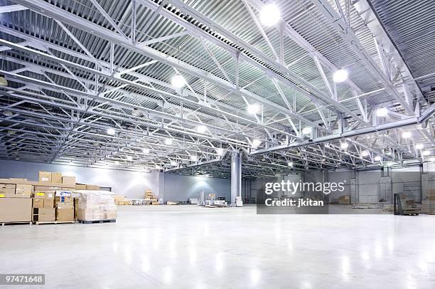 modern storehouse - ceiling light stock pictures, royalty-free photos & images