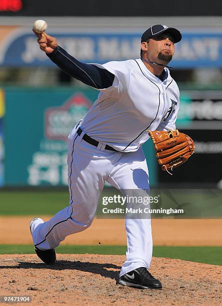 Joel Zumaya of the Detroit Tigers pitches against the Houston Astros during a spring training game at Joker Marchant Stadium on March 5, 2010 in...