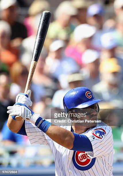 Aramis Ramirez of the Chicago Cubs bats against the Oakland Athletics during the MLB spring training game at HoHoKam Park on March 4, 2009 in Mesa,...