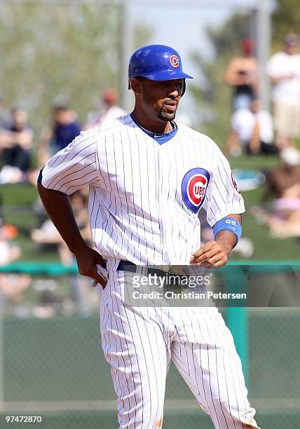 Derrek Lee of the Chicago Cubs stands on second base during the MLB spring training game against the Oakland Athletics at HoHoKam Park on March 4,...