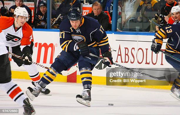 Raffi Torres of the Buffalo Sabres tries to keep his balance and control the puck against the Philadelphia Flyers on March 5, 2010 at HSBC Arena in...