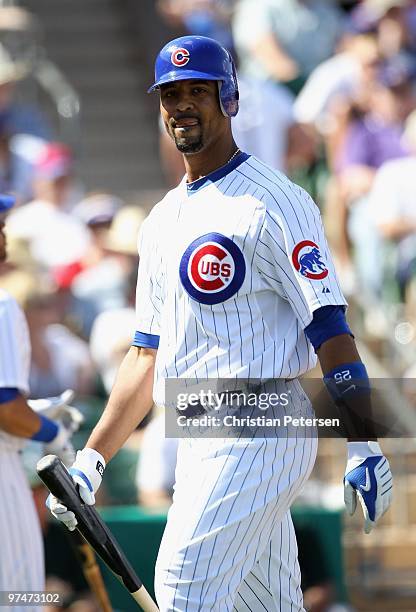 Derrek Lee of the Chicago Cubs walks to the dugout during the MLB spring training game against the Oakland Athletics at HoHoKam Park on March 4, 2009...