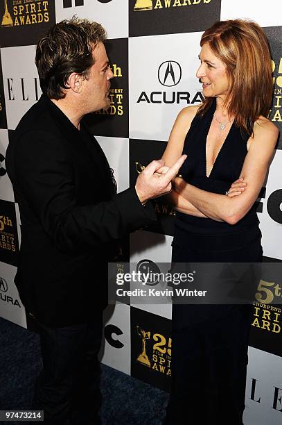 Actor Eddie Izzard and Film Independent Executive Director Dawn Hudson arrive at the 25th Film Independent's Spirit Awards held at Nokia Event Deck...