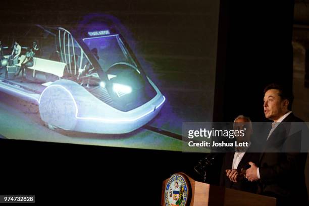 Chicago Mayor Rahm Emanuel listens to engineer and tech entrepreneur Elon Musk of The Boring Company talks about constructing a high speed transit...
