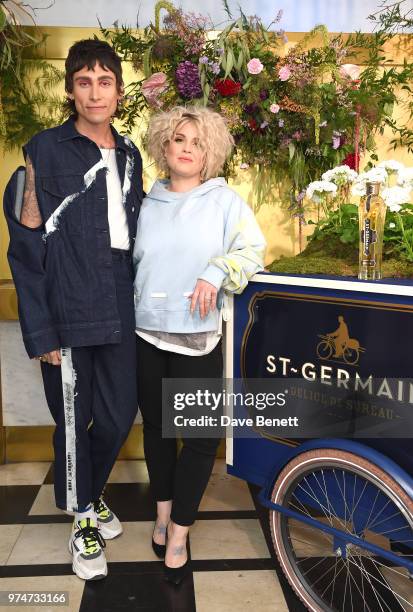 Kyle De Volle and Kelly Osbourne attend Maison St Germain x House of Holland Opening Night in Mayfair on June 14, 2018 in London, England.